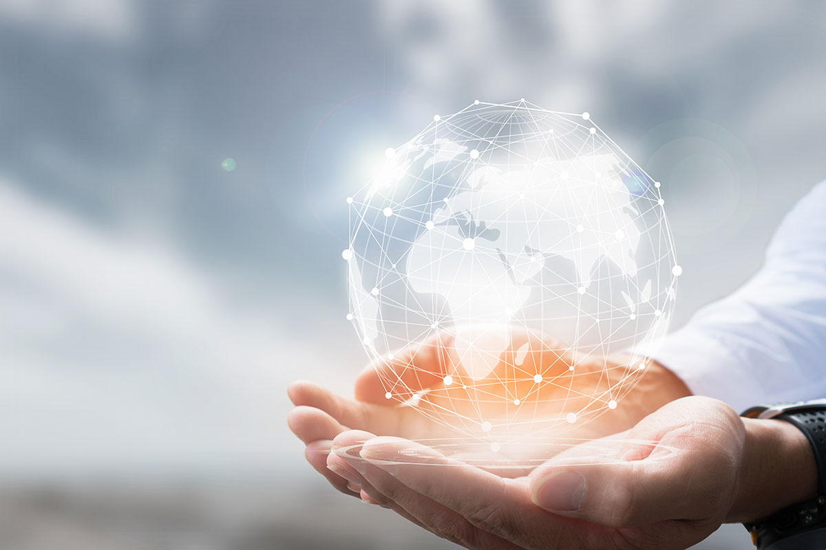 business man holding globe hologram